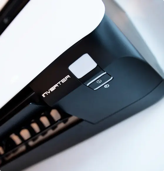 a close-up view of a printer set against a black and white background, highlighting its features and design